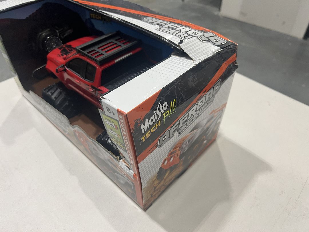 Damaged Box - Maisto R/C 1/16 Off Road 2019 Silverado - Red